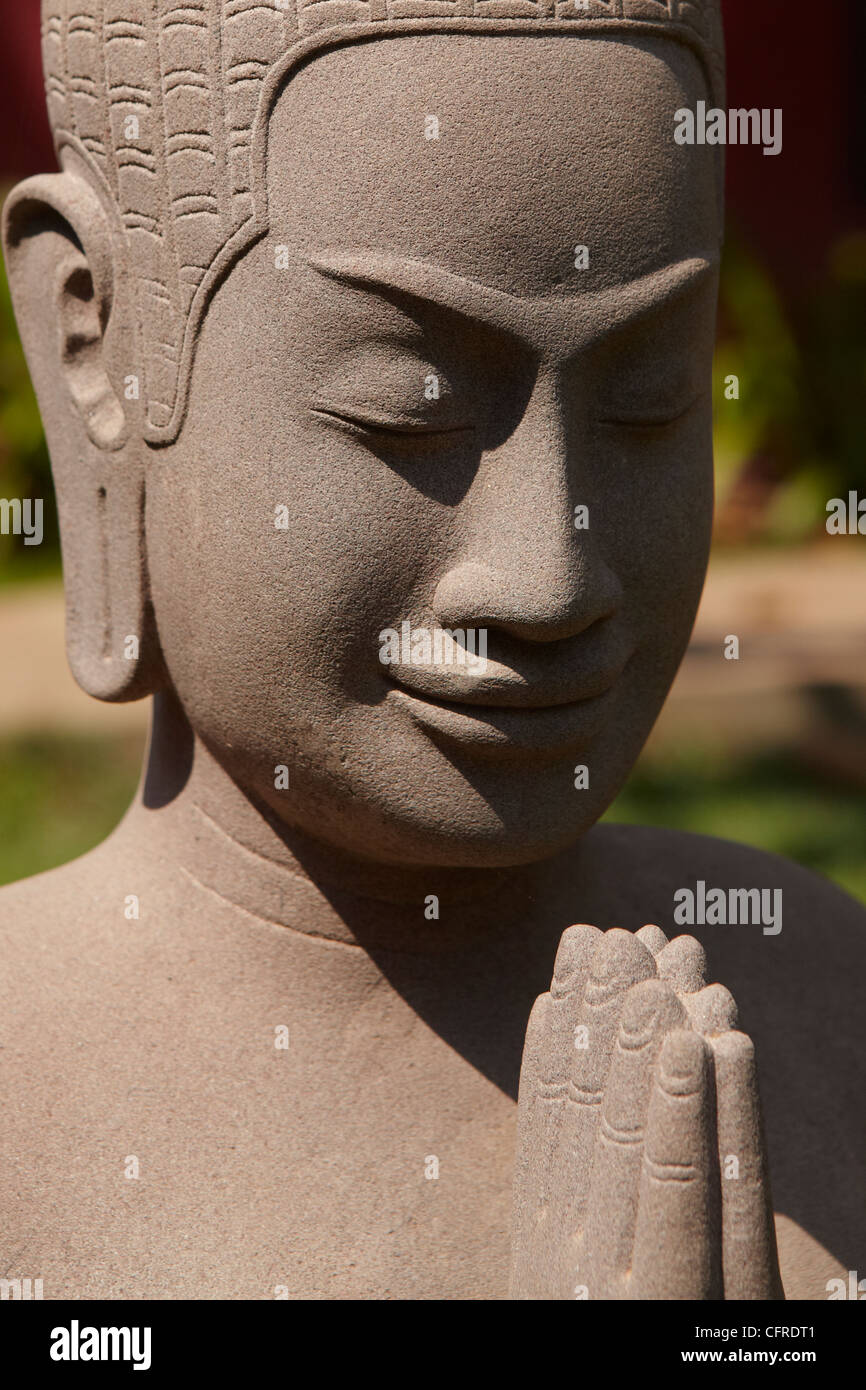 Detail of a Buddhist Statue in Siem Reap, Cambodia Stock Photo