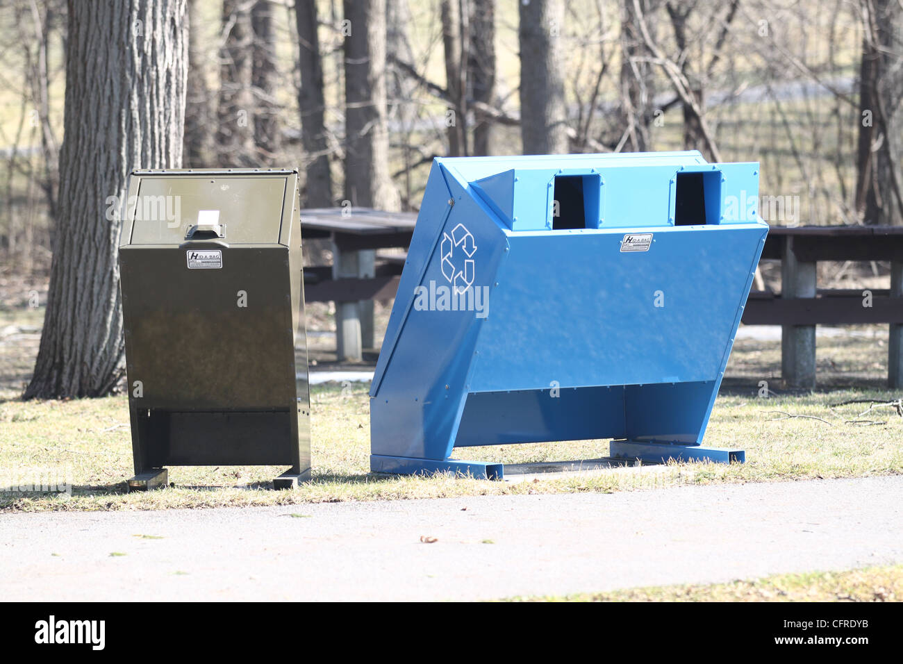 Two refuse containers, blue recycle and green garbage Stock Photo Alamy
