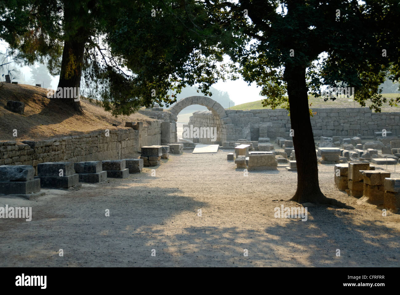 Olympia. Greece. Stone bases of the Zanes standing along the krepis of the Treasuries, in front