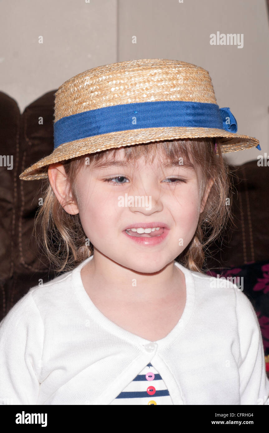Little Girl Child Infant Toddler Wearing A Straw Hat Stock Photo - Alamy