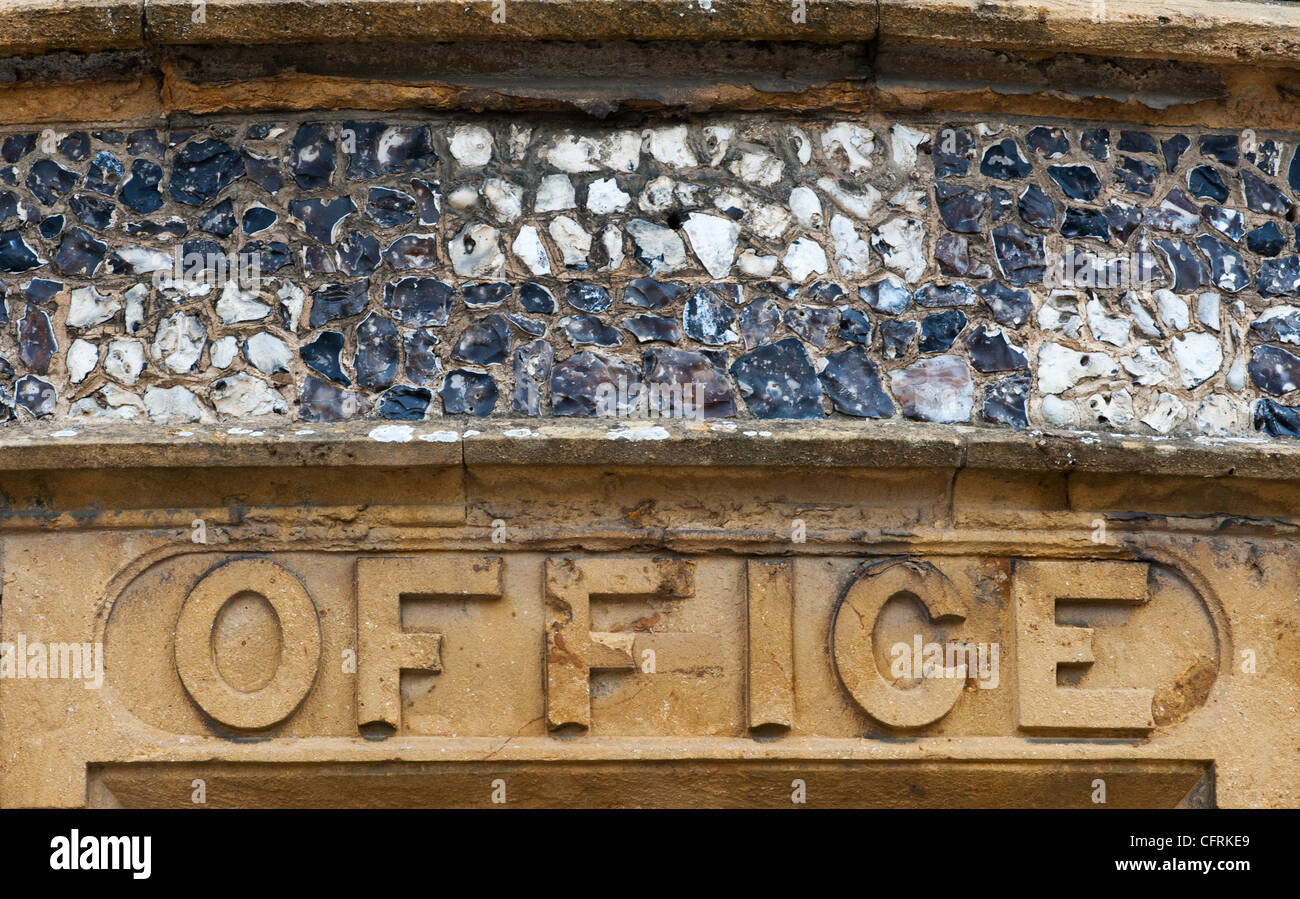 Office stone carving, Stow on the Wold. Cotswolds, England Stock Photo