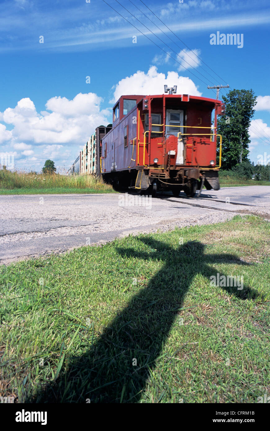 Train Caboose and Crossing Sign Shadow, Arkell, Ontario Stock Photo - Alamy