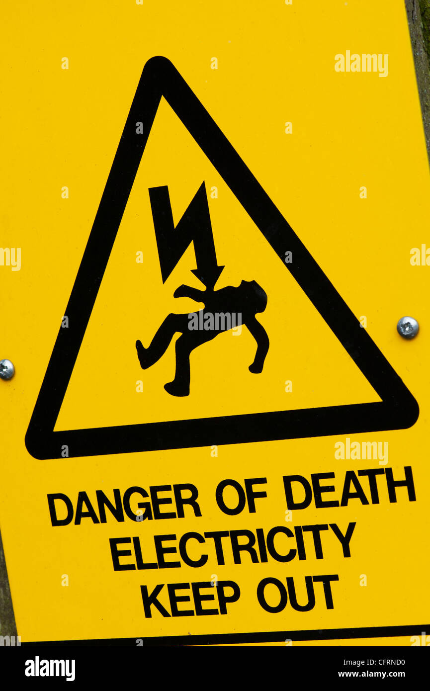 Danger of death and electrocution. Triangular electricity warning sign. UK Stock Photo
