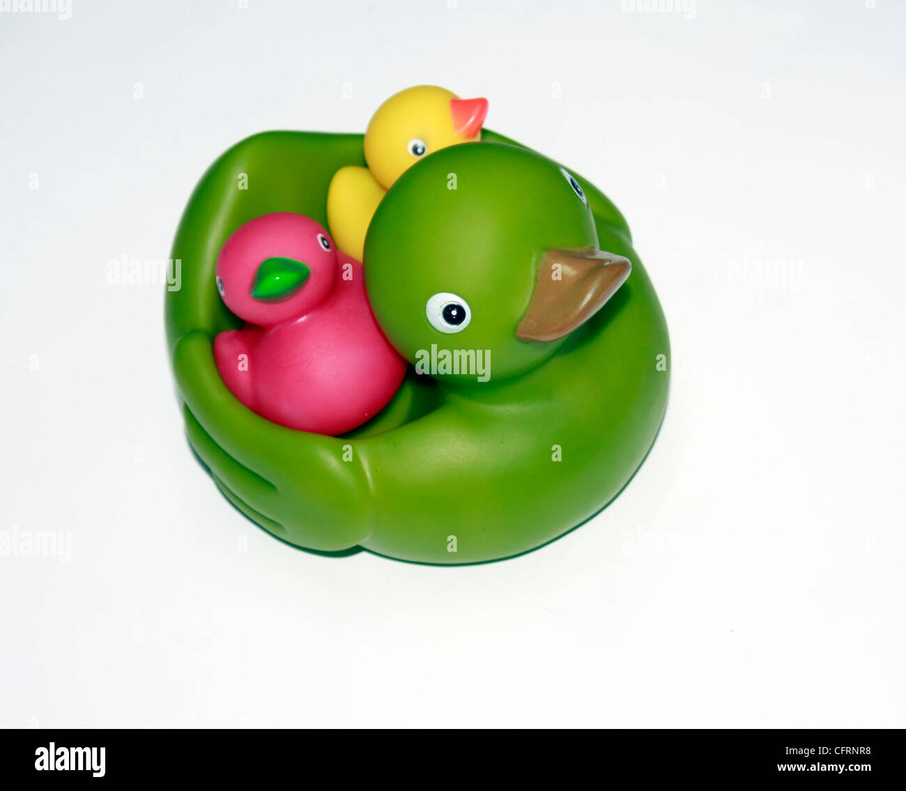 A cut out showing baby bath toys of a mother duck and ducklings Stock