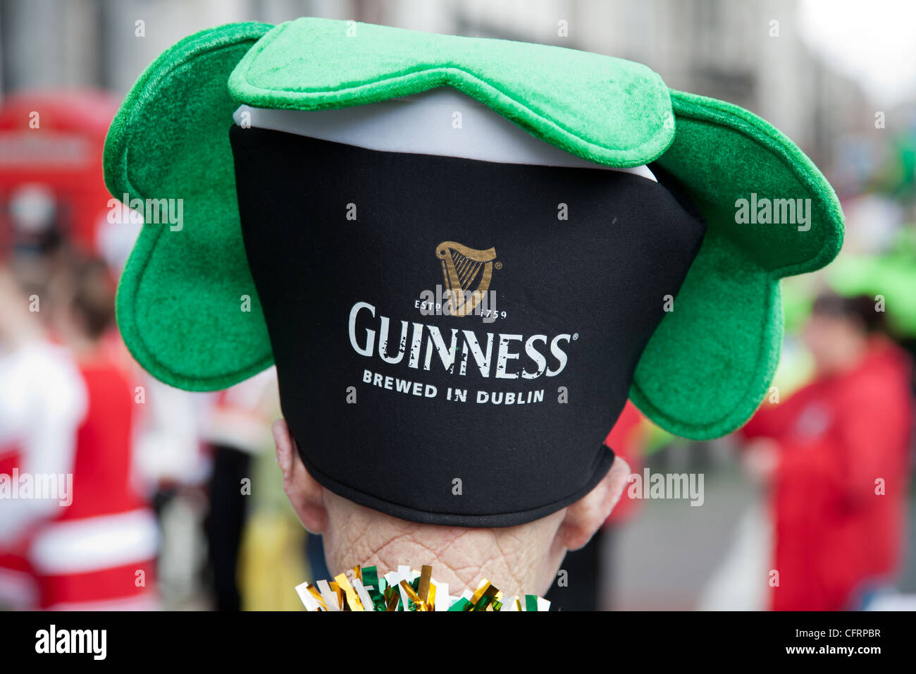 Guinness hat during St Patrick's day parade London Stock Photo - Alamy