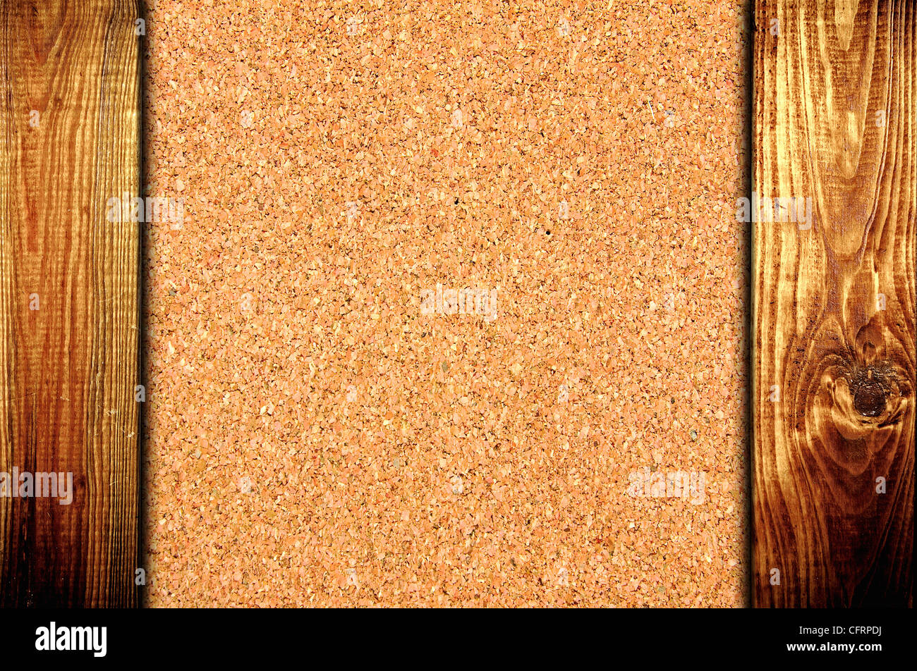 The cork board at wooden panel wall background Stock Photo