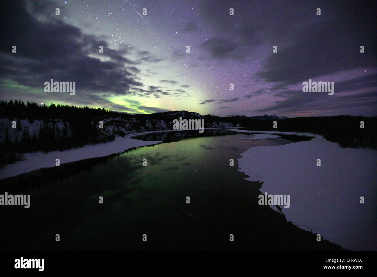 Aurora and a Meteor, Teslin River, Yukon Stock Photo