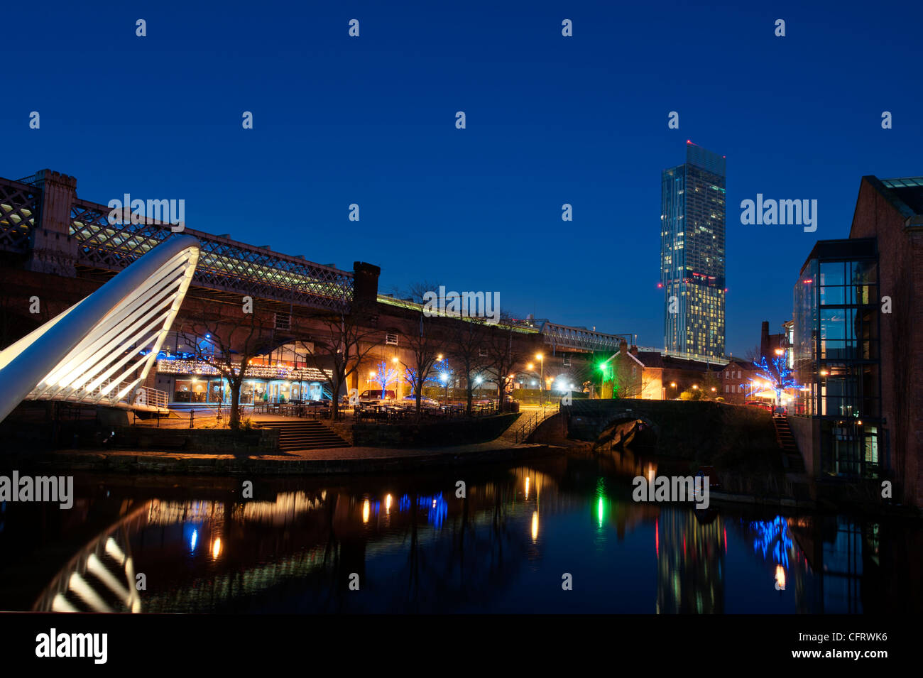 A night shot of canal at Castlefield, Manchester with Beetham Tower in the background. Stock Photo