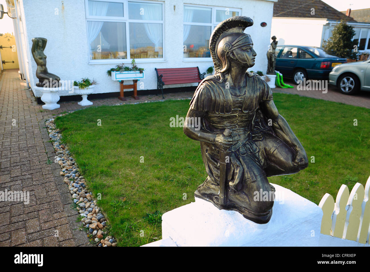 Ornamental Roman Centurion figure on gatepost of house, Greatstone, Kent Stock Photo