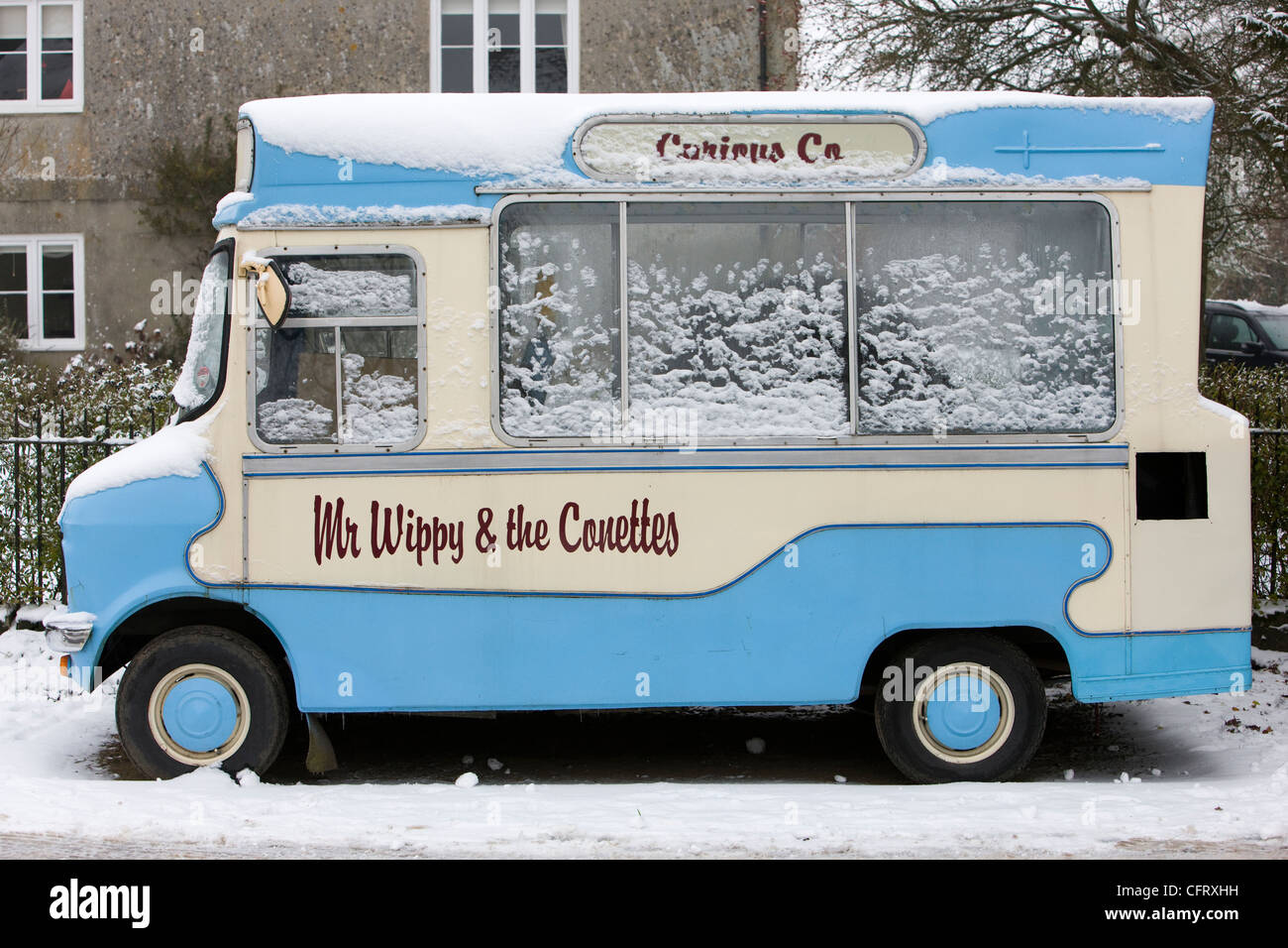 Ice cream van covered in snow Stock Photo Alamy