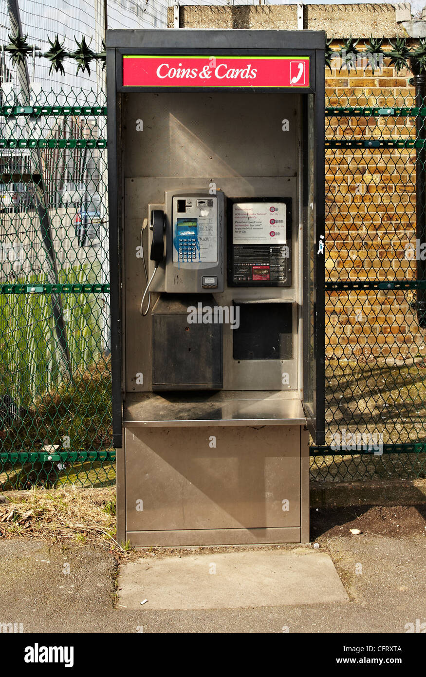 Open Style BT telephone box that takes coins and cards Stock Photo