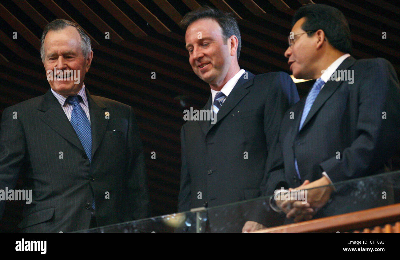 FOR METRO - Former U.S. President George H. W. Bush (from left), U.S. Ambassador to Mexico Tony Garza, and Attorney General Alberto Gonzales talk after attending Felipe Caldreon's swearing in ceremony as the new Mexican President Friday Dec. 1, 2006 at the Mexican Congress hall in Mexico City, Mexic Stock Photo