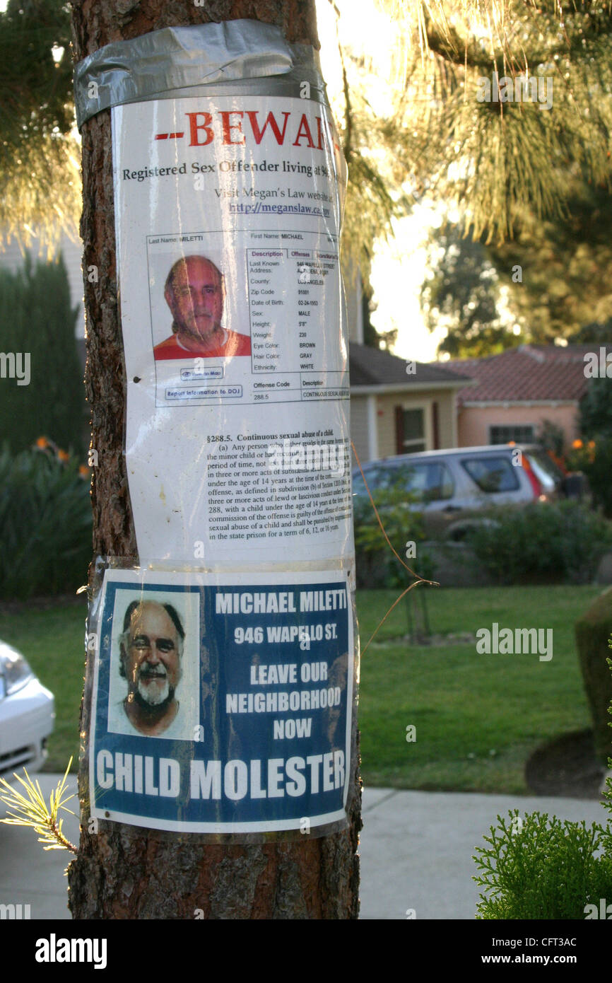 Dec 07, 2006; Altadena, CA, USA; Convicted child molester Michael Miletti's face, name and address appear on posters lining Wapello Street in Altadena, with the admonishment: 'Leave Our Neighborhood Now Child Molester.' Up since May, the signs are staked into lawns, taped to trash cans and nailed to Stock Photo