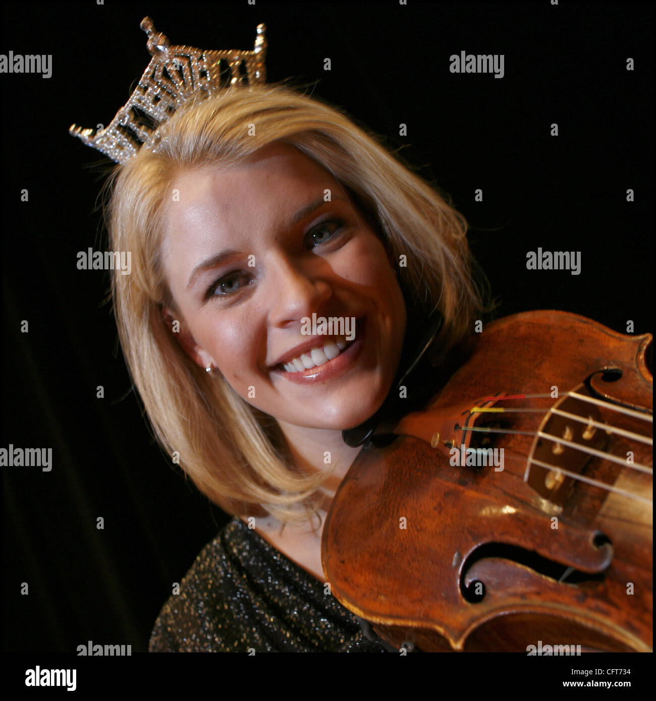 TOM WALLACE • twallace@startribune.com Nicole Swanson, the 23-year-old Miss Minnesota from Lakeville is a violist, who is making music education her platform in her run for Miss America (the pageant is Jan. 29 in Los Vegas). She played Dec. 9 at a free holiday concert for the Minnesota Youth Symphon Stock Photo