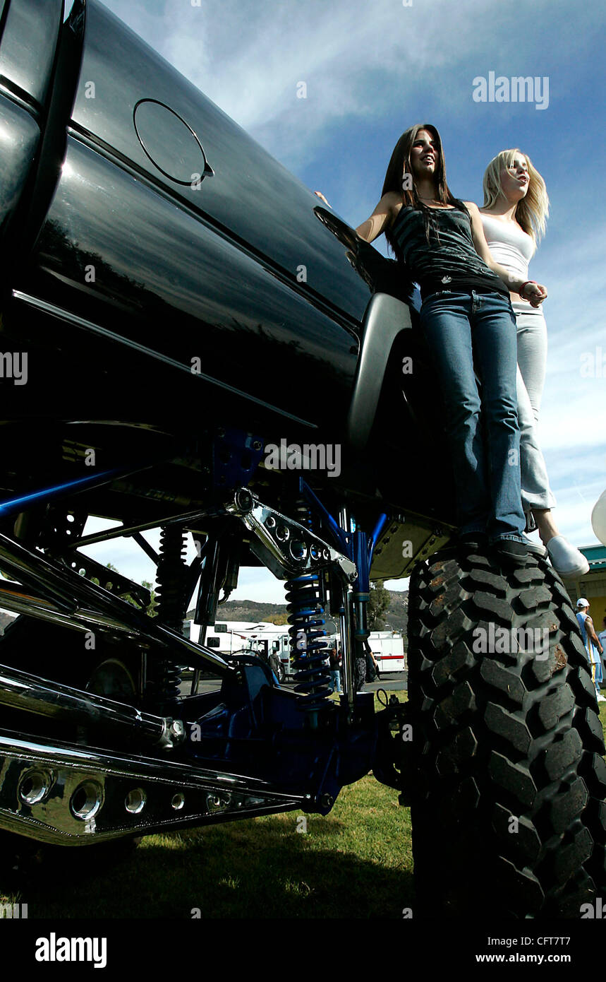 Thursday, December14, 2006, San Marcos, California, USA Nikia Davies, 16, left, and Tamara Leap, 16, get a high-angle view of the Twin Oaks High School yard thanks to a giant lifted truck at the Choices Challenge event on Thursday.  'It’s my dream truck,' gushed Davies.  Extreme lifted trucks, like  Stock Photo