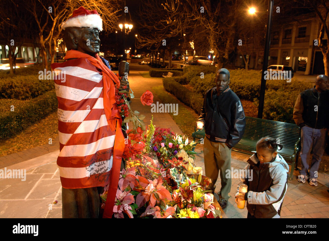 James Brown's fans pay their respects at the soul singer's bronze