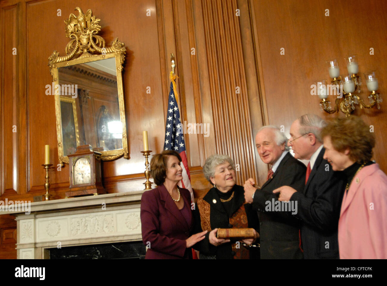 Jan 04, 2007 - Washington, DC, USA - Speaker of the House NANCY PELOSI swears in Rep. SANDERS LEVIN (D-MI) for the 110th Congress. Sanders was joined by his brother Carl, who serves as a Senator from Michigan. Stock Photo
