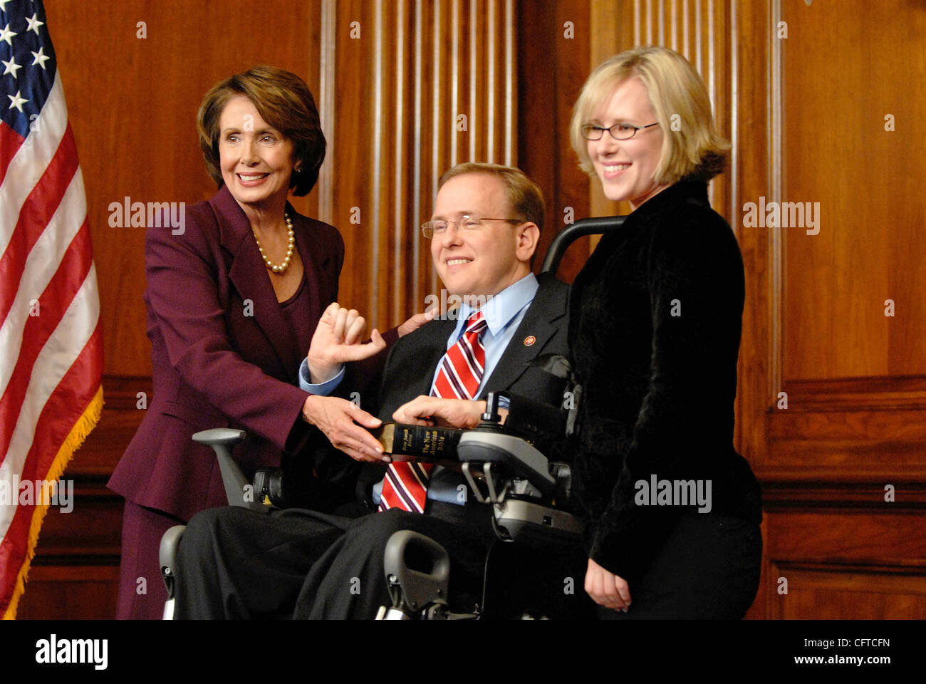 Jan 04, 2007 - Washington, DC, USA - Speaker of the House NANCY PELOSI swears in Rep. JAMES LANGEVIN (D-RI) for the 110th Congress. Stock Photo