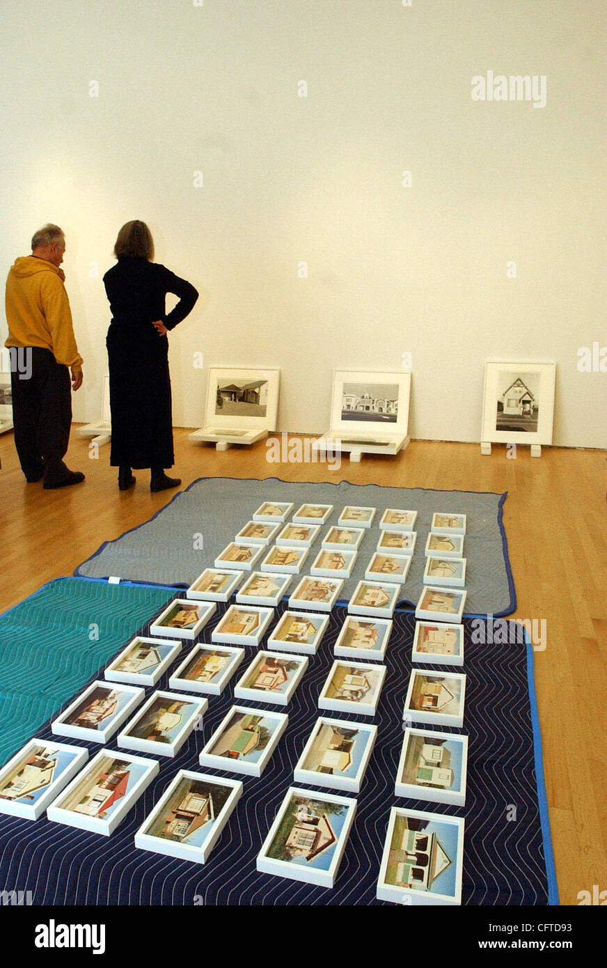 Pt. Richmond photographer Henry Wessel and Sandra S. Phillips, senior curator of photography at SFMOMA, look over the installation of a retrospect of Wessel's work at SFMOMA in San Francisco, Calif., on Monday, Jan. 8, 2007.  (JOANNA JHANDA/CONTRA COSTA TIMES) Stock Photo