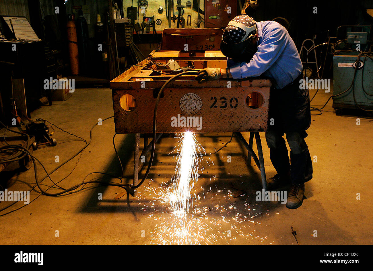 Tuesday, January 9, 2006, San Marcos, California, USA Welder Lorenzo Flores, 46, works on