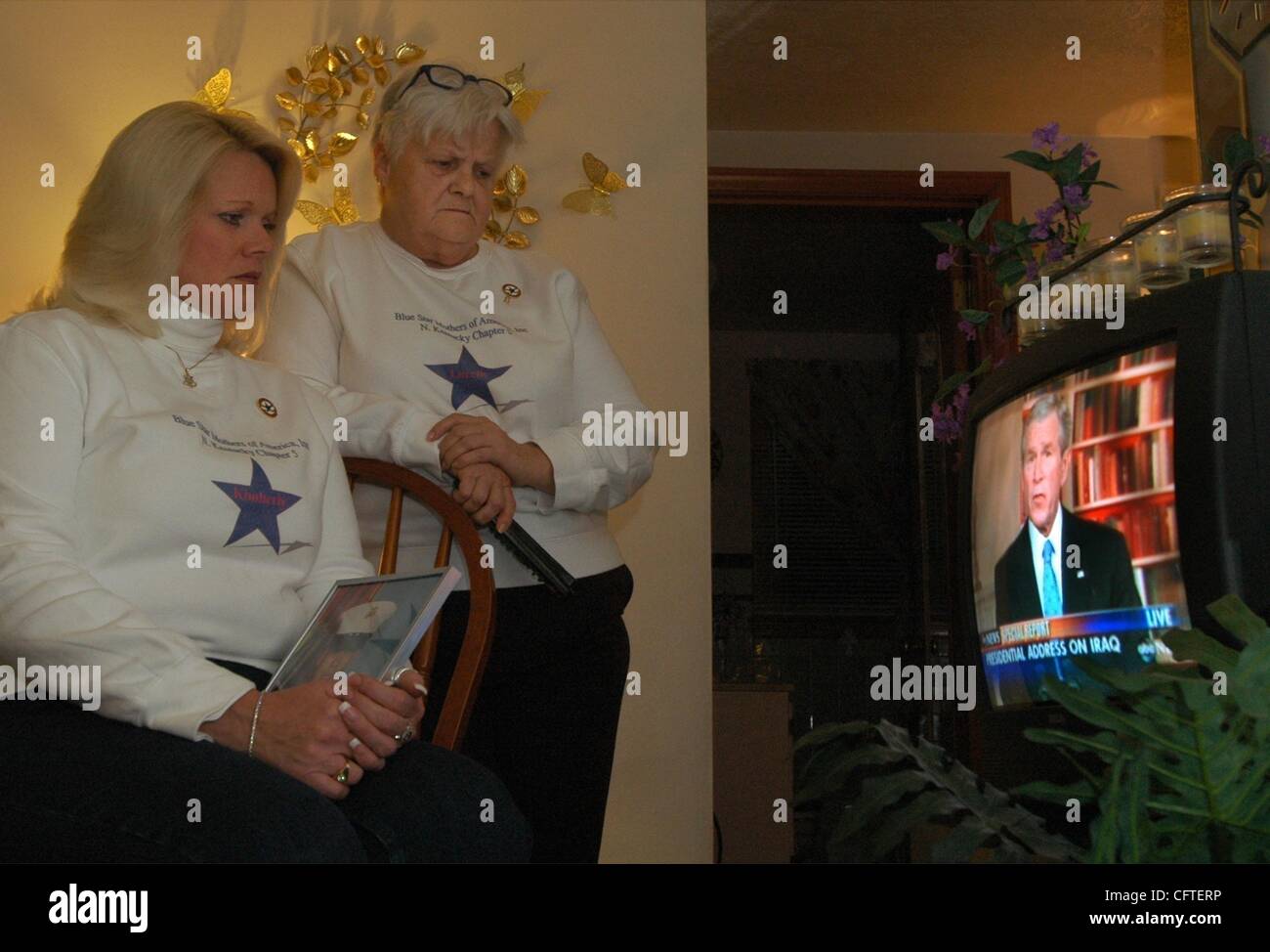 Jan 10, 2007 - Florence, Kentucky, USA - With two sons in the Marine Corps Bluestar mother KIMBERLY PIOL of Florence, watches President George W. Bush on television, with her mother Lorrain Friedman. The President is outlining his latest plans for the Iraq war.  (Credit Image: Â© Ken Stewart/ZUMA Pr Stock Photo