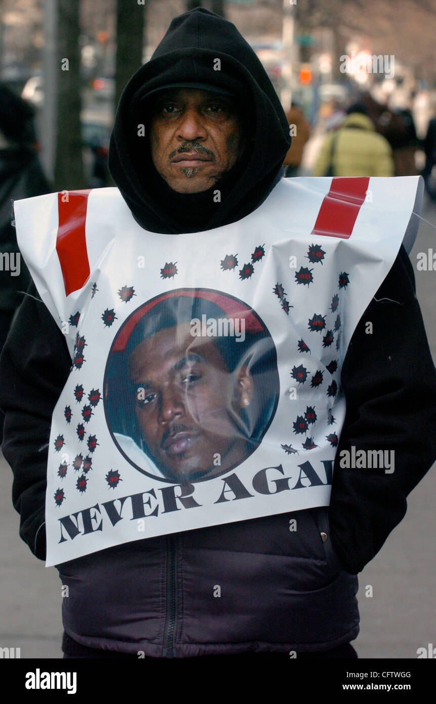Al Walker, of Long Island, uncle to Sean Bell wears a vest with Sean Bell's  picture on it outside Queens Criminal Court. Two months after the shooting  of Sean Bell a grand