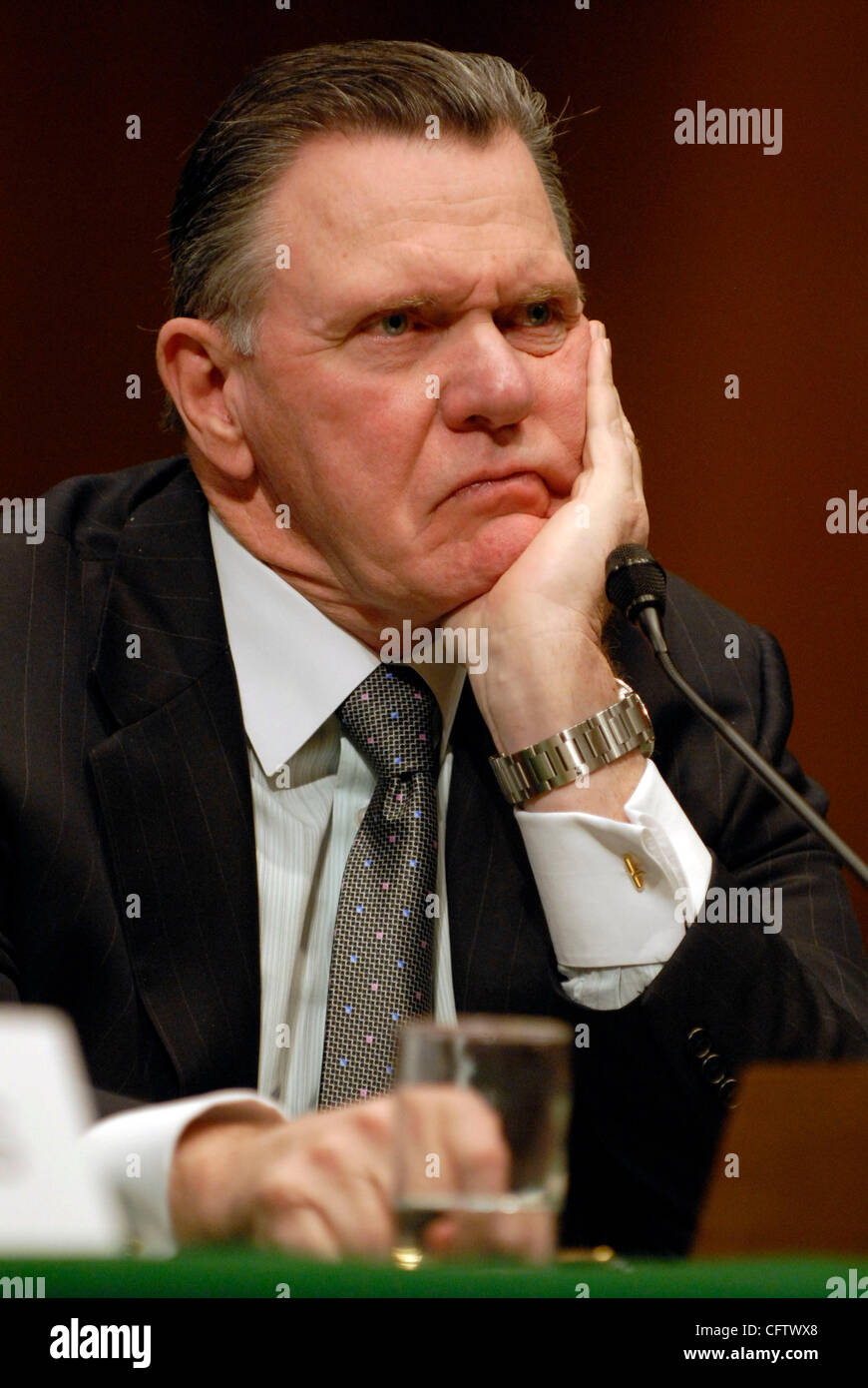 Jan 25, 2007 - Washington, DC, USA - Retired General JOHN KEANE, former vice chief of staff for the Army, listens to questions from Carl Levin (D-MI), chairman of the Senate Armed Services committee, during a hearing on US options in the Iraq war. Stock Photo