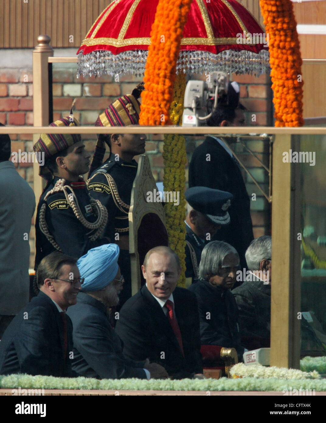 (l-r)Russian Defence Minister Sergei Ivanov,Prime Minister of India Dr. Manmohan Singh,President of Russia Vladimir Putin,President of India Abdul Kalam attending military parade in Deli on the Independance Day of India. Stock Photo