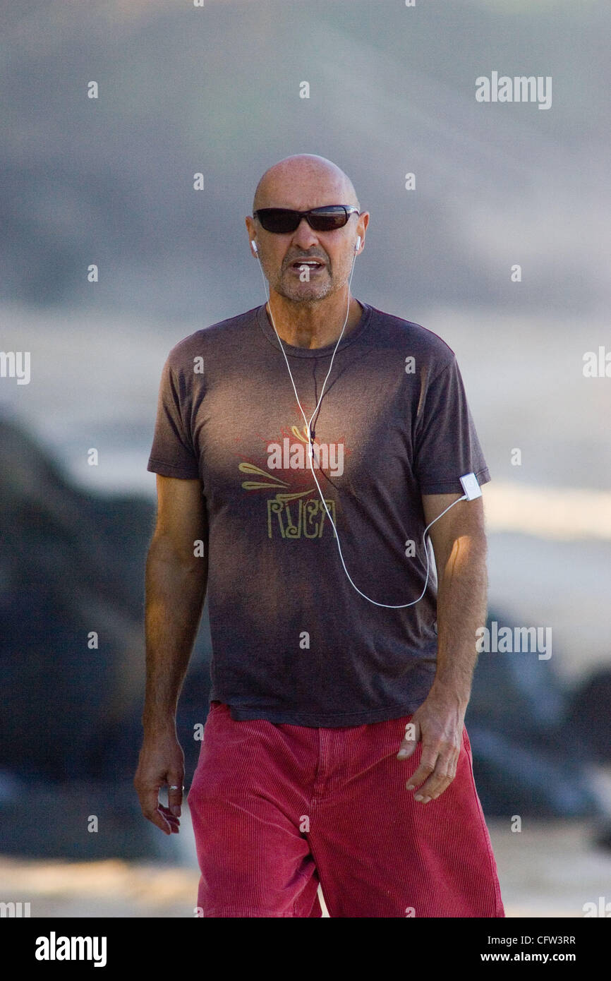 SEEN HERE: Taking his Daily jog on the North Shore.   Terry O'Quinn who plays 'Locke' on the TV show LOST Stock Photo