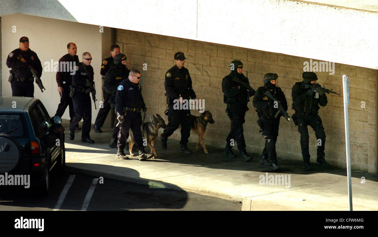 A Contra Costa Sheriffs Swat Team And K9 Units Approach The Safeway Store On Tara Hills Drive 