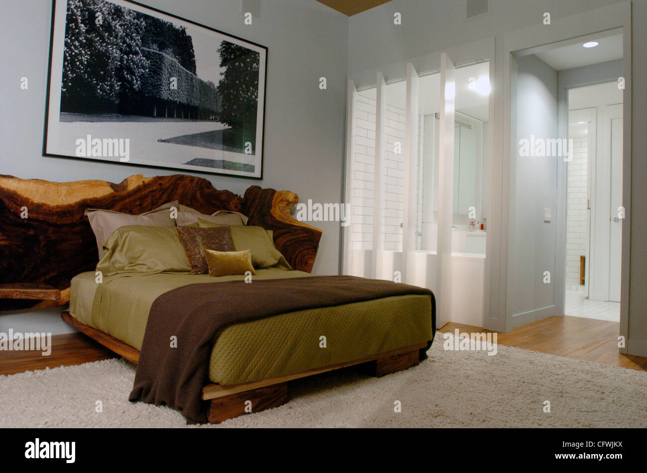 A Model Of A Bedroom And Bathroom Of A Condominium Of