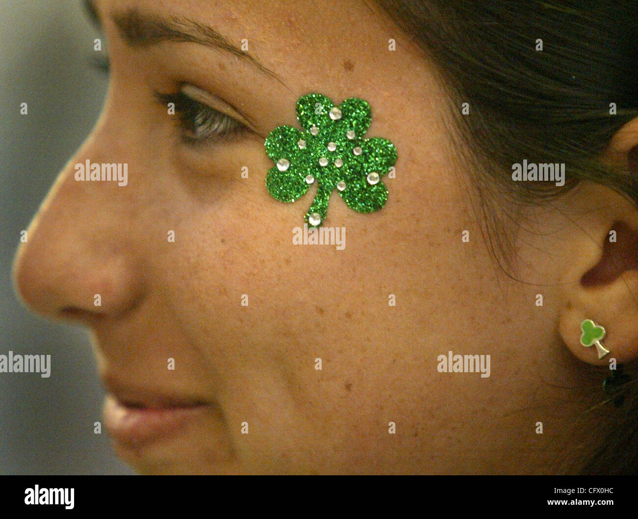 Mar 16, 2007 - Boca Raton, FL, USA - Even though her hair is staying attached to her head, Olympic Heights student JANELL WEYER, 14, shows her spirit with a shamrock appliquŽ and earrings during the school's St. Baldrick's Day celebration Friday, March 16, 2007.(Credit Image: © Chris Matula/Palm Bea Stock Photo