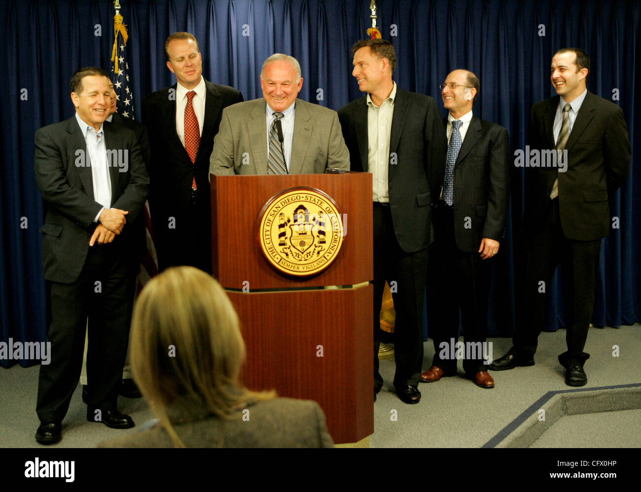 March 16, 2007 San Diego, CA San Diego city attorney MIKE AQUIRRE, left, council members JIM MADAFFER, KEVIN FAULCONER, Mayor JERRY SANDERS, center, council member SCOTT PETERS, chief financial officer JAY GOLDSTONE, and deputy comptroller GREG LEVIN, right, are 'all smiles', during a press conferen Stock Photo