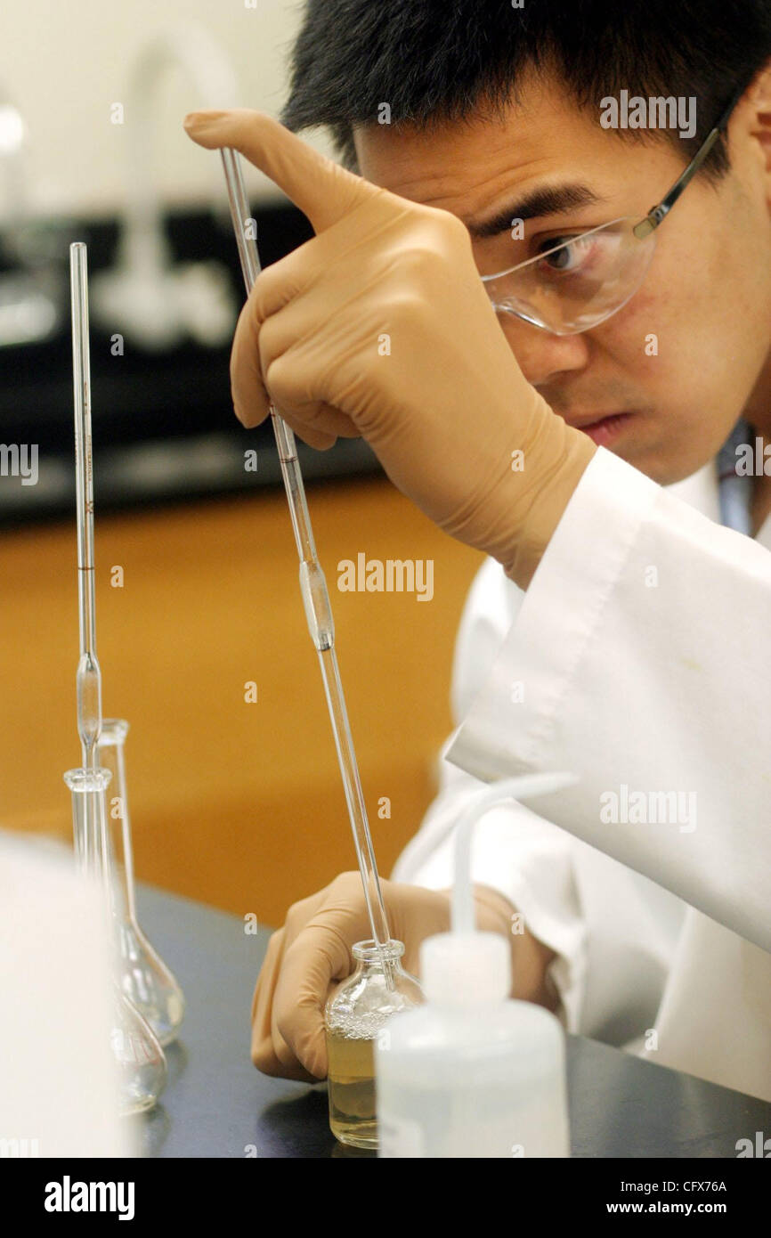 Ryan Szeto, Quality Control Analyst in the Chemistry Lab, works on a