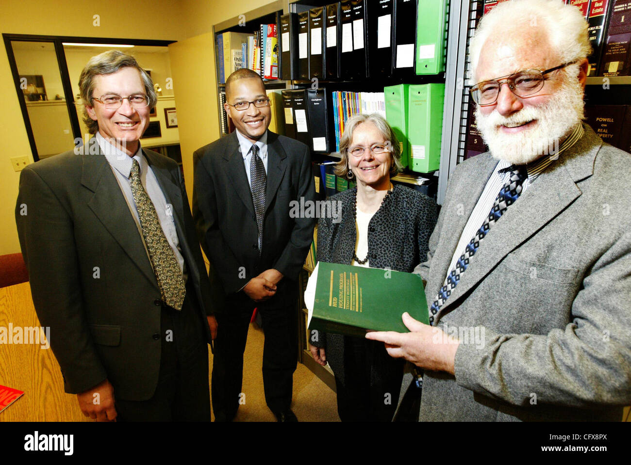 National Housing Law Project Attorneys Jim Grow, left, Alaric degrafinried, Catherine Bishop and executive director Gideon Anders at their office in Oakland, Calif., on Wednesday Mar. 28, 2007. Their company won $500,000 from the MacArthur Foundation for its effort advocating on behalf of tennants a Stock Photo