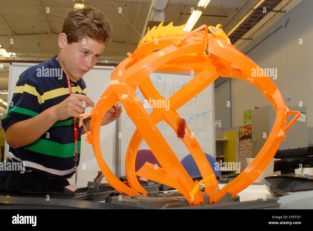 FRANKIE NECOECHA learns about track design as Matttel, Inc. , the world