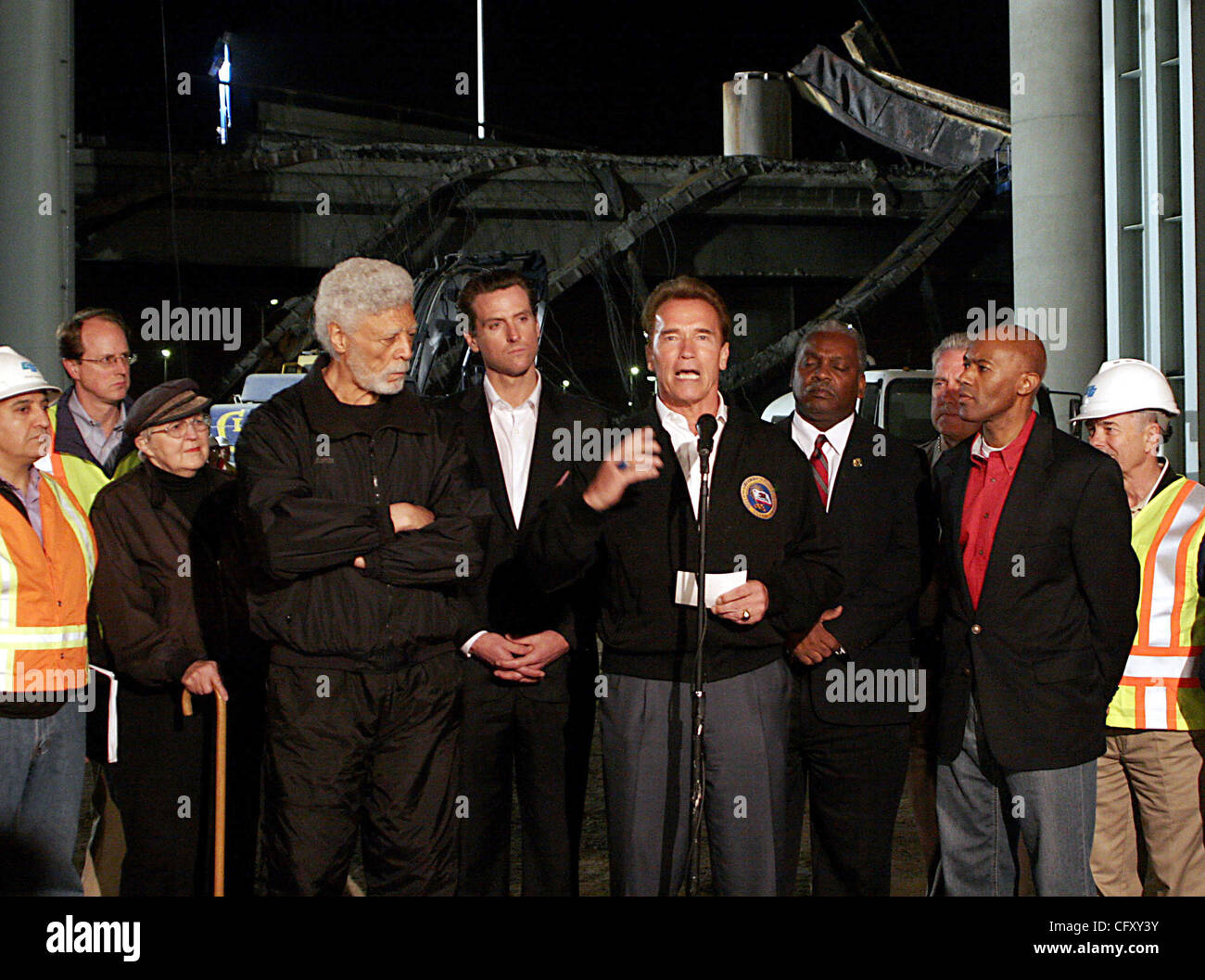 California Governor Arnold Schwarzenegger (center) gives a statement