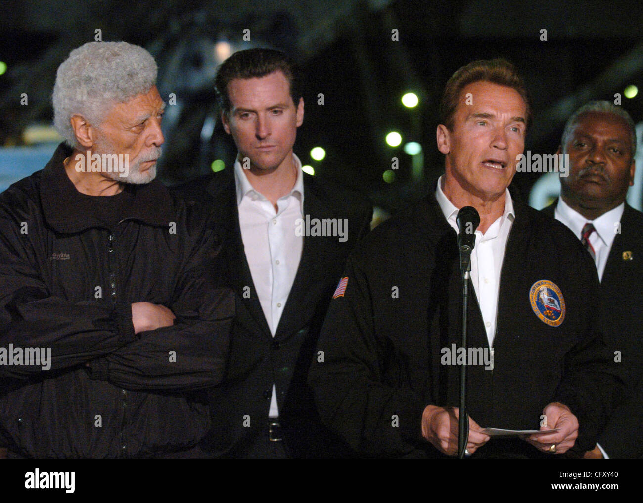 California Governor Arnold Schwarzenegger (right) gives a statement
