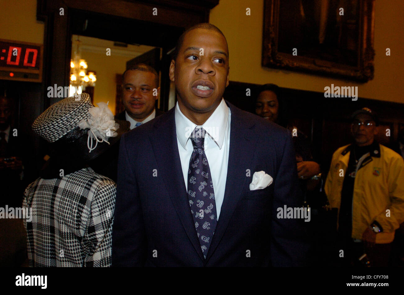JayZ arrives to City Council Chambers. Gloria Carter, CEO of the Shawn