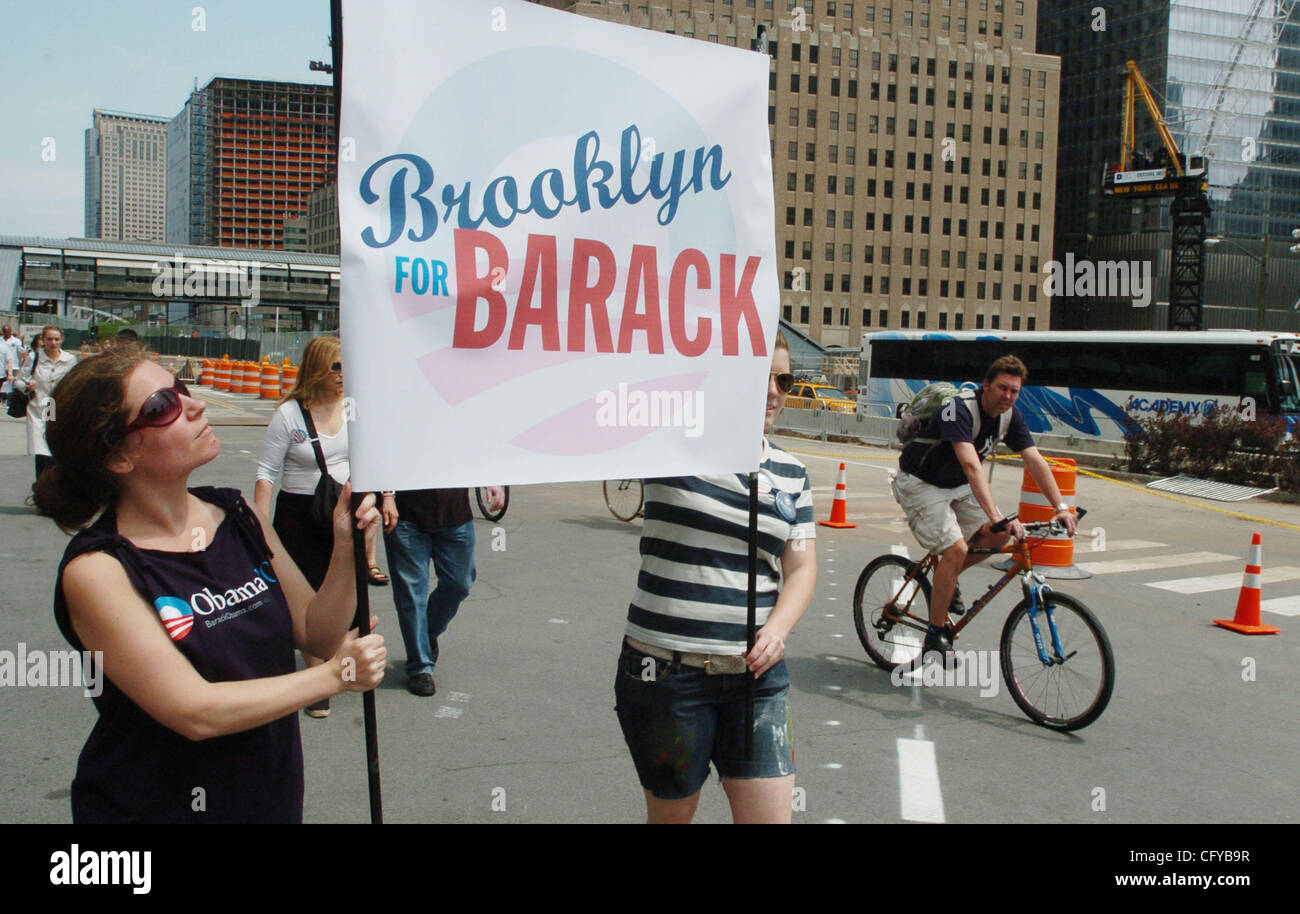 Jacki Esposito (L) and Sarah Baker (R), both of Brooklyn carry a sign ...