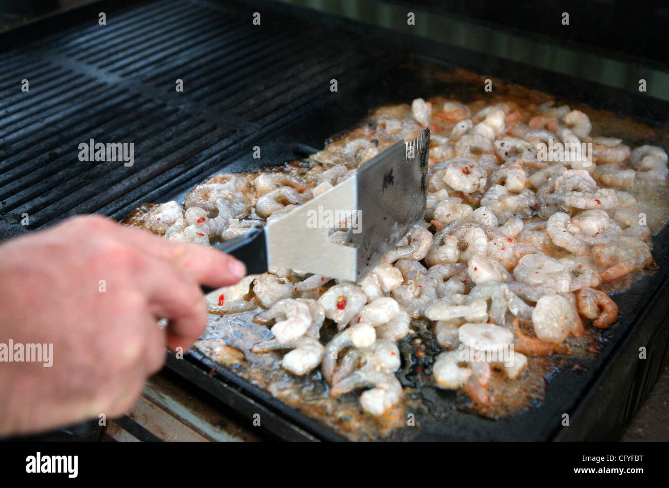 May 16, 2007 - Alice Springs, Northern Territory, Australia - Shrimp on the barbie at a barbeque in Alice Springs. (Credit Image: © Marianna Day Massey/ZUMA Press) Stock Photo