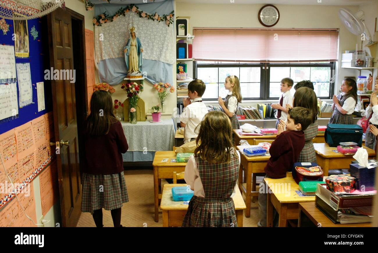 May 18, 2007 Melville, New York, USA Children pray at St. Pius V