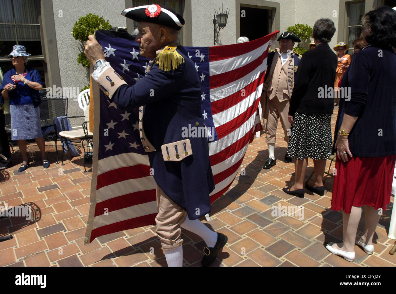 Alvie Hartsog, near, and Bill Gledhill, both of the Santa Clara chapter of the National Sojourners, carry in the flag for a presentation to the Piedmont Area Republican Women in Piedmont, Calif. on Saturday, May 19, 2007.  (Kristopher Skinner/ Contra Costa Times) Stock Photo
