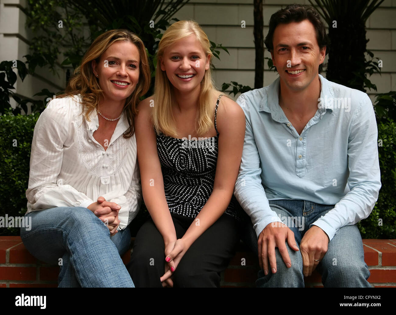 Actresses Elizabeth Shue, Carly Schroeder, age 16, and actor Andrew Shue are photographed at the Ritz Carlton on Friday, May 25, 2007 in San Francisco, Calif. Schroder is a new movie called 'Gracie', opening June 1st. The movie is inspired by events in the life of Elisabeth Shue while growing up. (J Stock Photo
