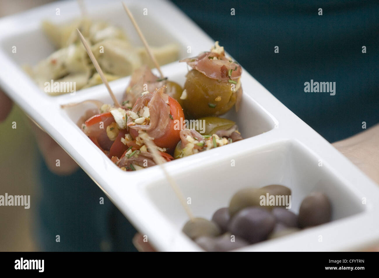 Italian food to eat when watching the Sopranos last episode. Stuffed olives, artichoke hearts, and olives. (Mike Lucia/Tri-Valley Herald) Stock Photo