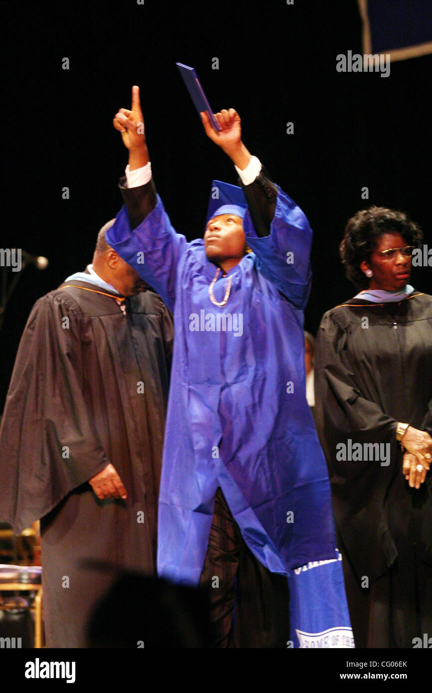 Ricky Reeves celebrates upon receiving his diploma during Wednesday's ...