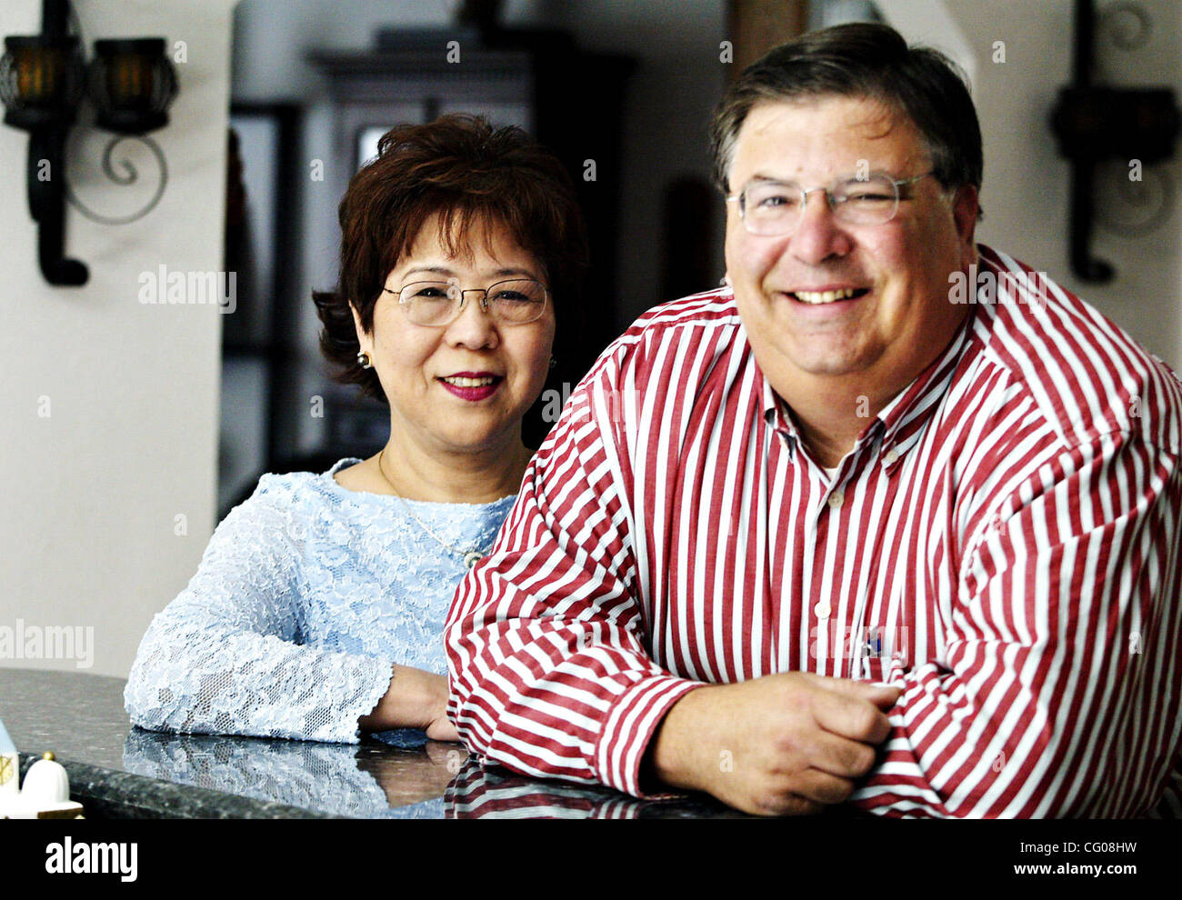 Noriko Wolfe and her husband Dennis Wolfe (LtoR) at their home in Fremont, California, on Thursday June 14, 2007. Noriko had a child from a previous marriage. (Anda Chu/The Fremont Argus) Stock Photo
