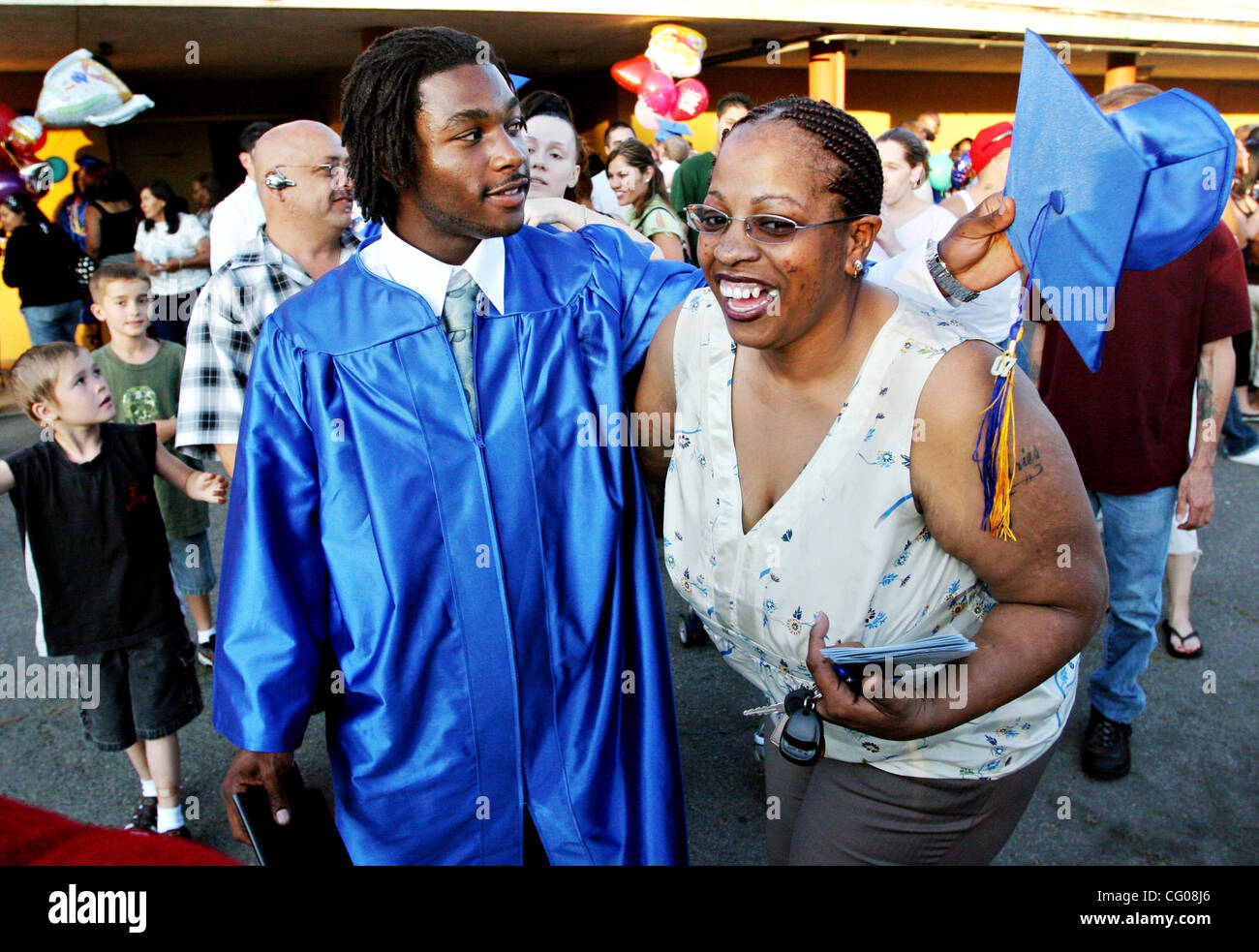 Anthony Hill celebrates with his mother Lillian Hill after graduation ceremonies at Hayward Adult School on Thursday, June 14, 2007, in Hayward, Calif. (Jane Tyska/The Daily Review) Stock Photo