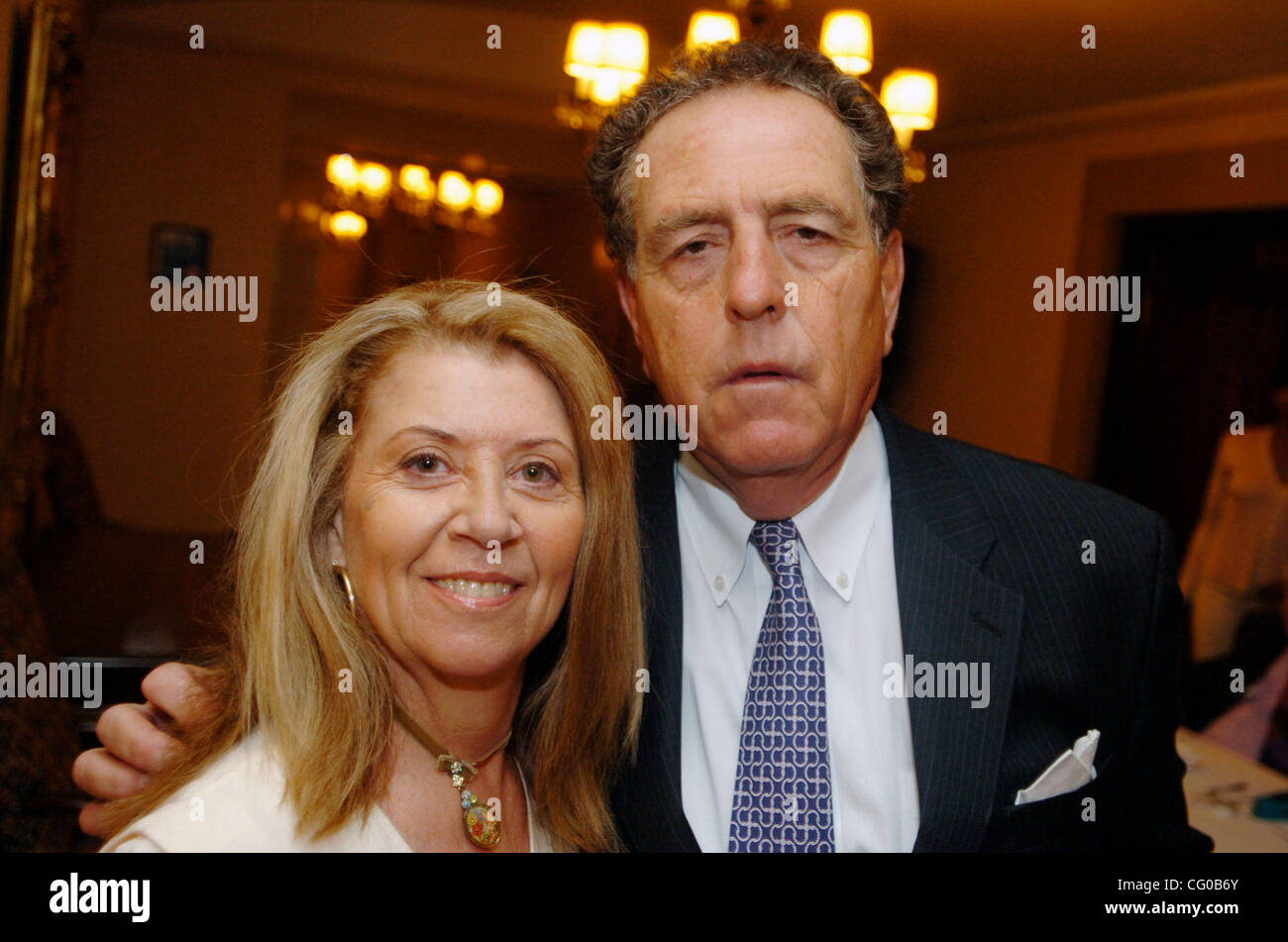 Esther Muller (L), co-founder and master teacher, The Real Estate Academy, photographed with Peter Marra (R), Exec. VP Brown, Harris, Stevens, as she hosts a seminar titled 'News, Views, and Current Real Estate Trends' in the conference rooms of the NY Athletic Club on Central Park South. Stock Photo