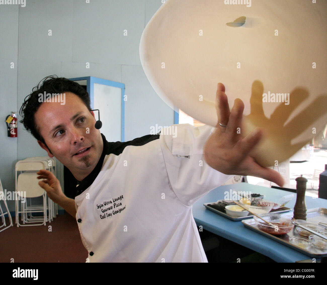 (Jay Solmonson/Tri-Valley Herald)  Tony Gemignani tosses pizza dough during a demonstration of the world-class skill at the Dourt of Four Seasons at the Alameda County Farigrounds in Pleasanton. Stock Photo